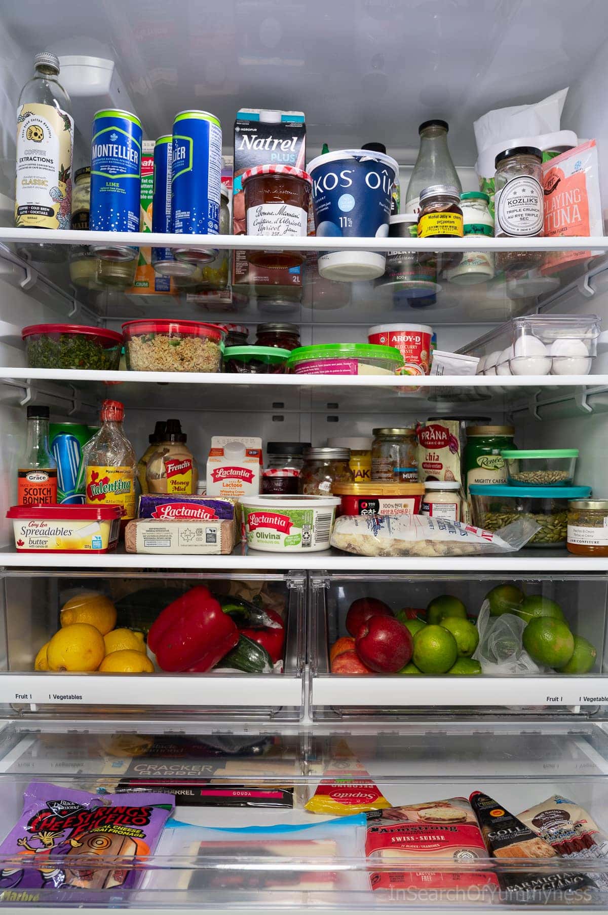 Open fridge with everyday ingredients for AI recipe ideas